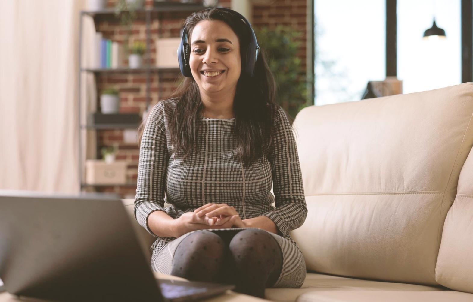 Game development workspace with creative tools and planning materials